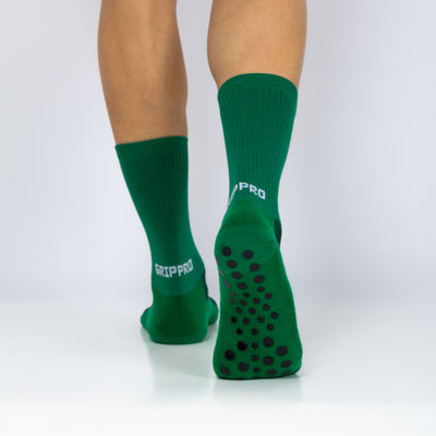 Meias com antiderrapante (grip), na cor verde, para desporto como o futebol ou futsal..
