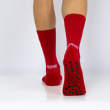 Meias com antiderrapante (grip), na cor vermelho, para desporto como o futebol ou futsal..