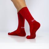 Meias com antiderrapante (grip), na cor vermelho, para desporto como o futebol ou futsal..