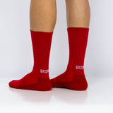 Meias com antiderrapante (grip), na cor vermelha, para desporto como o futebol ou futsal..