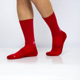 Meias com antiderrapante (grip), na cor vermelha, para desporto como o futebol ou futsal..