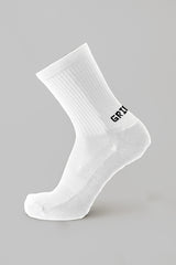 Meias com antiderrapante (grip), na cor branco, para desporto como o futebol ou futsal..