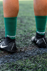 Meias com antiderrapante (grip), na cor verde, para desporto como o futebol ou futsal..