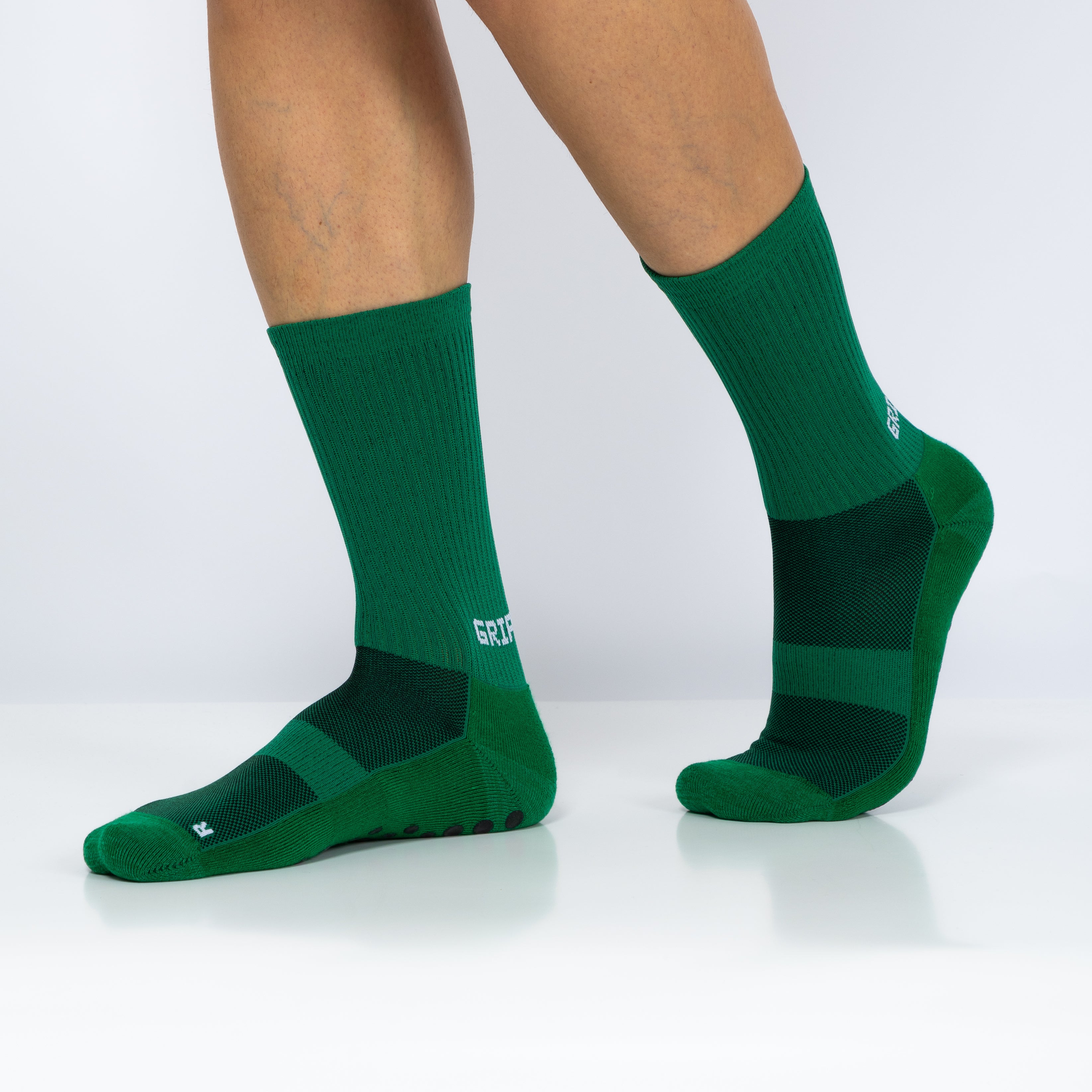 Meias com antiderrapante (grip), na cor verde, para desporto como o futebol ou futsal..