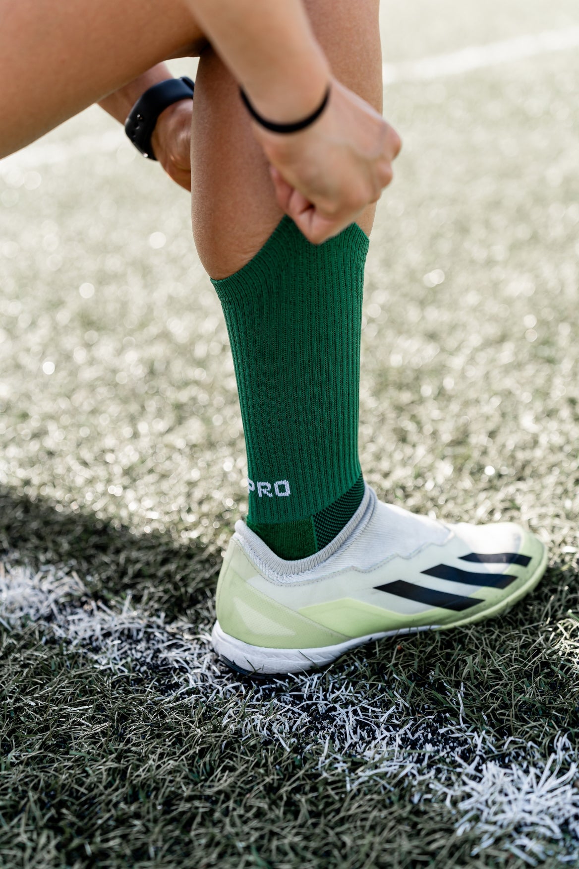 Meias com antiderrapante (grip), na cor verde, para desporto como o futebol ou futsal..