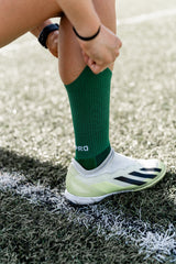 Meias com antiderrapante (grip), na cor verde, para desporto como o futebol ou futsal..