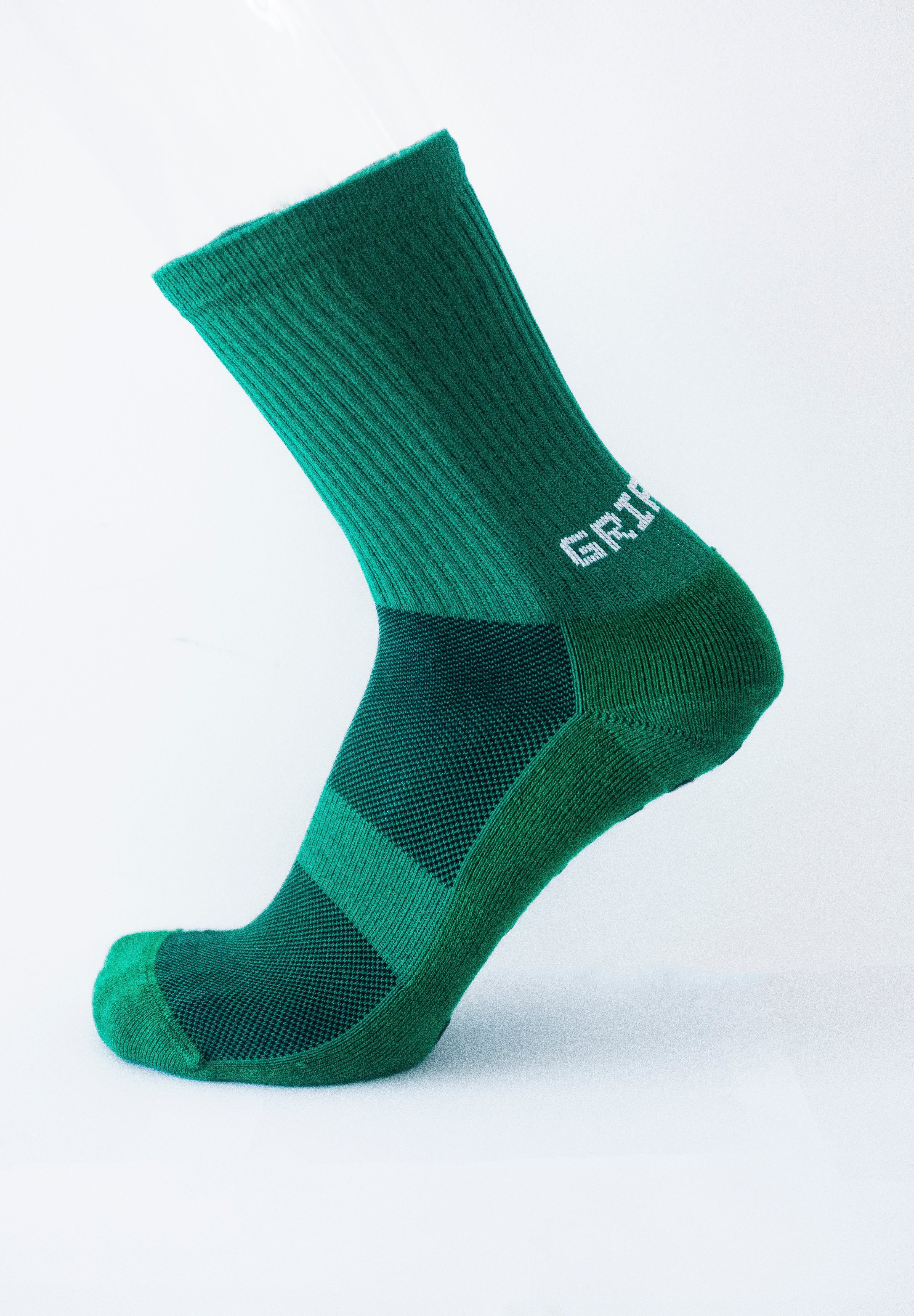 Meias com antiderrapante (grip), na cor verde, para desporto como o futebol ou futsal..