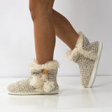 Pantufla con suela de goma y pelo interior beige