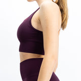 Top de desporto, na cor bordô, para mulher. Top com bom suporte no peito.Perfeito para atividades de alto desempenho.
